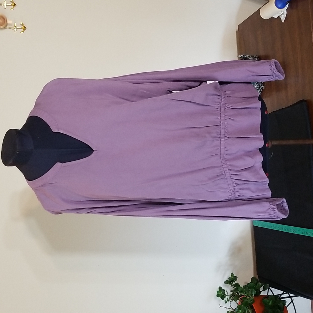 Jennifer Lopez Lavender long sleeve peplum top
